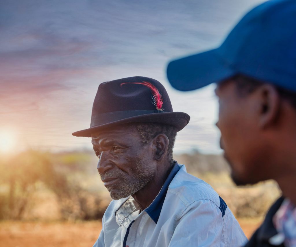 african men sharing